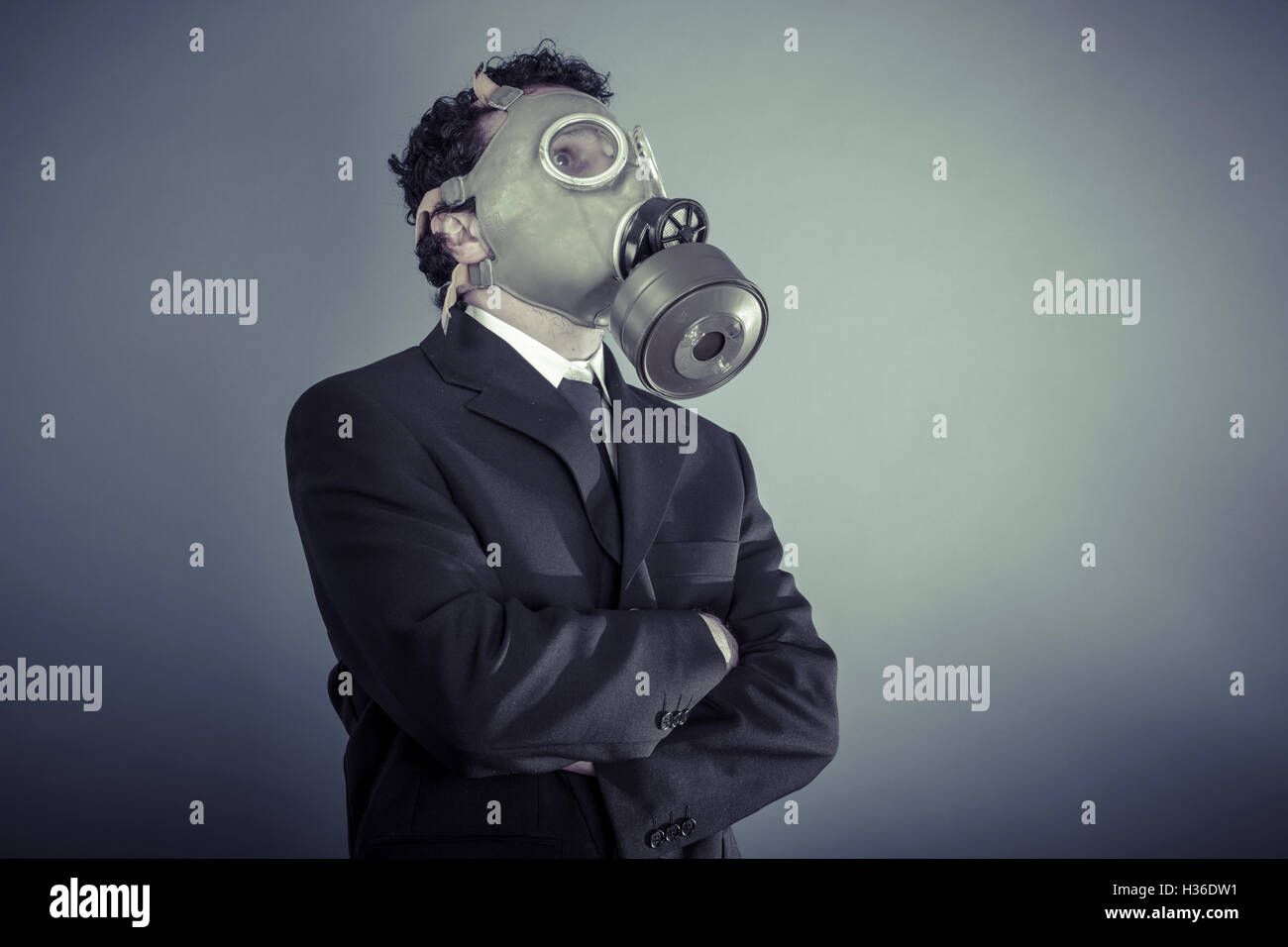 Gefahr, Geschäftsmann, tragen eines Gask Maske, Verschmutzung-Konzept Stockfoto
