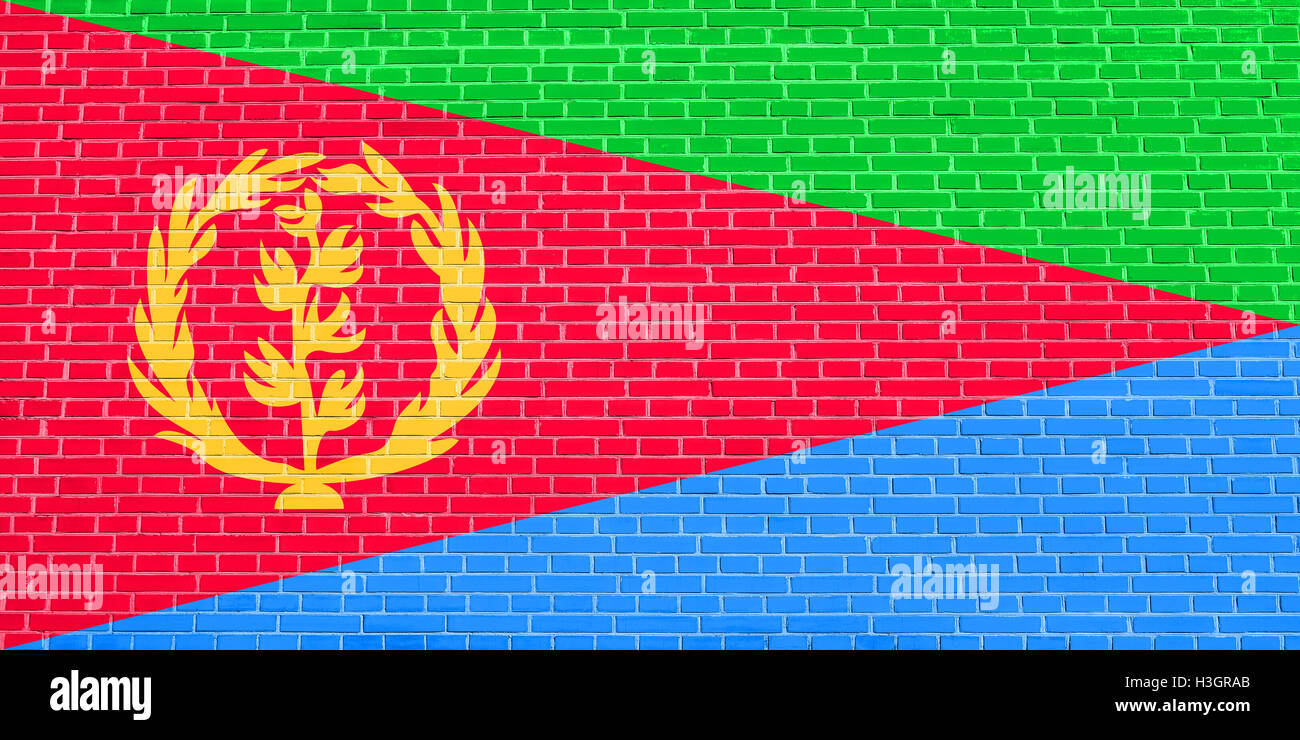 Eritreische offizielle Nationalflagge. Afrikanische patriotischen Symbol, Banner, Element, Hintergrund. Flagge von Eritrea auf Ziegel Wand Textur Stockfoto