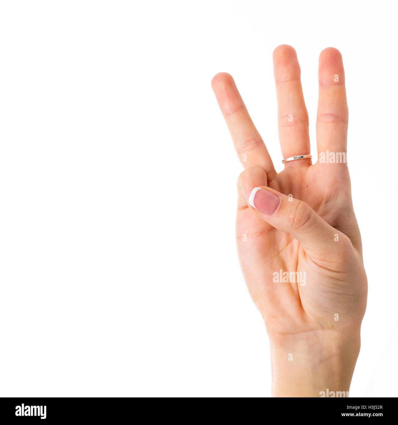 Hand mit drei Fingern Stockfoto