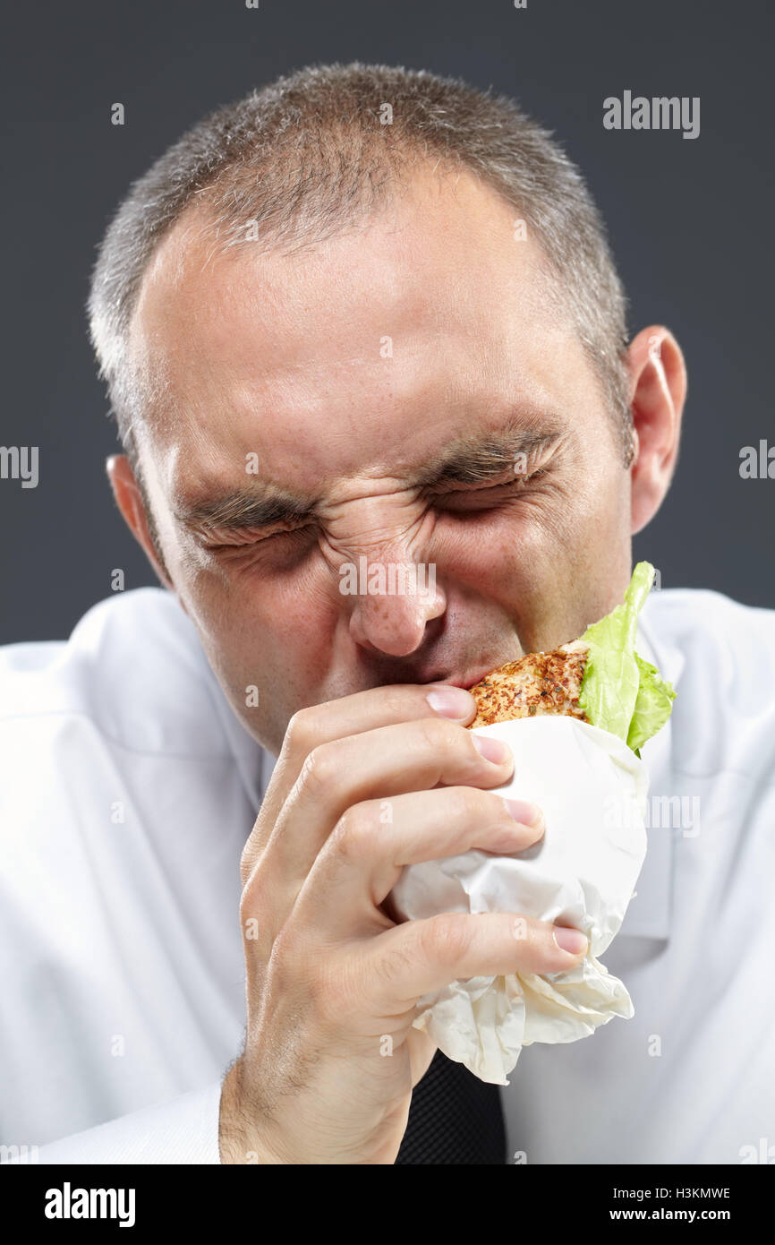 Junk-Food im Büro Stockfoto