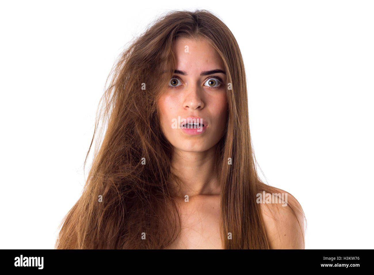 Frau mit Hälfte der Haare gerade und verwirrt Stockfoto