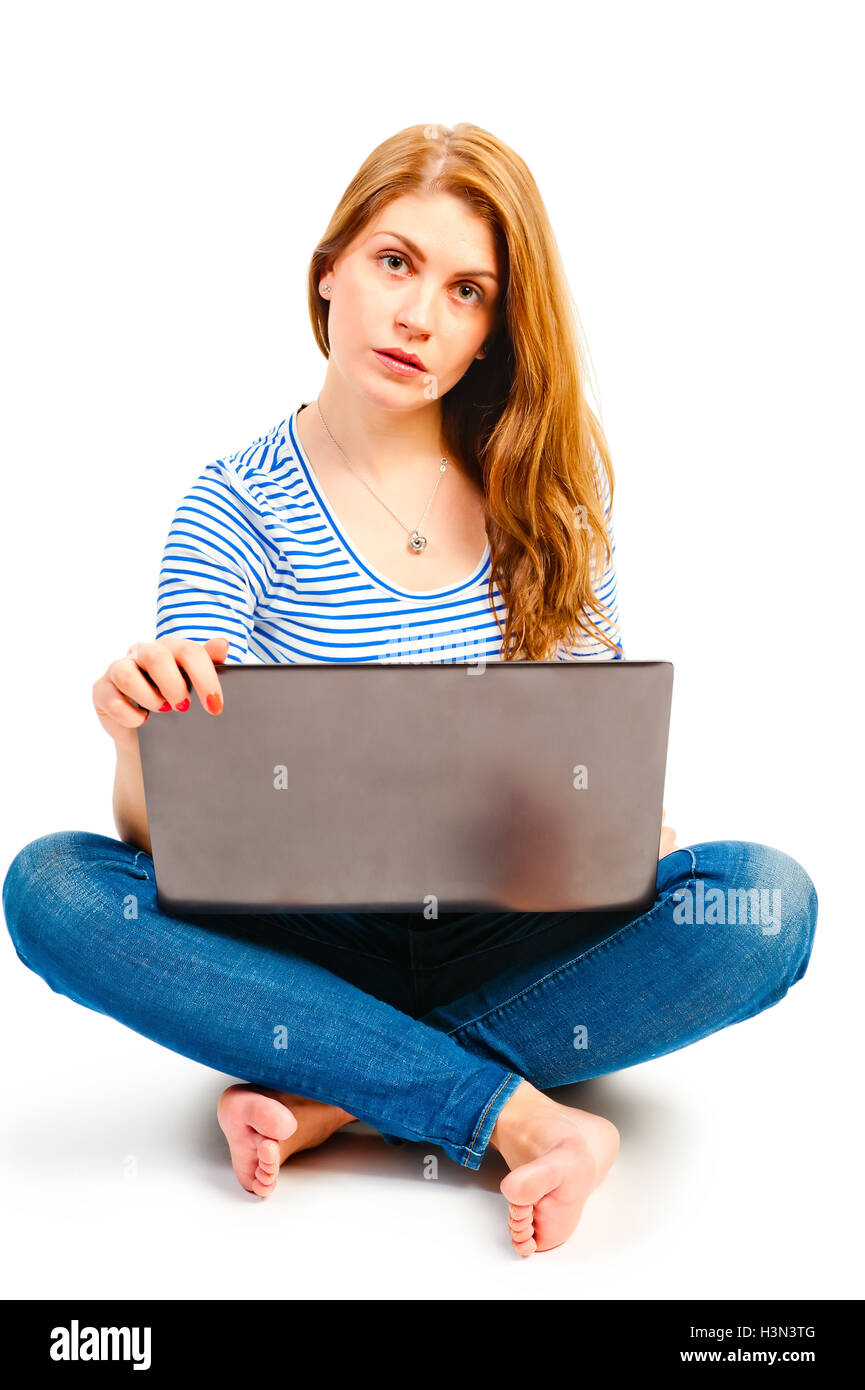 schöne Frau posiert mit einem laptop Stockfoto