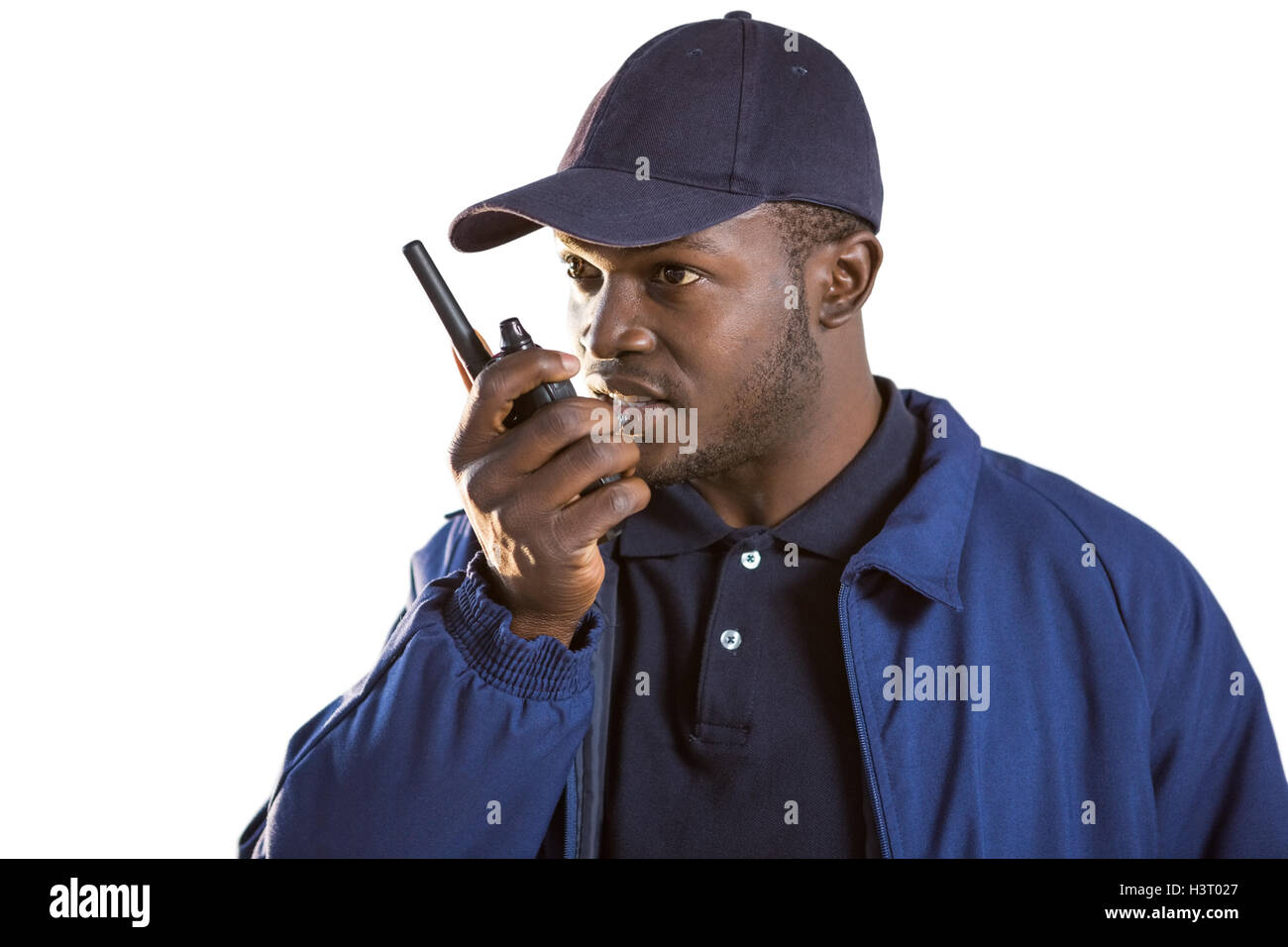 Security-Officer am Walkie-talkie sprechen Stockfoto