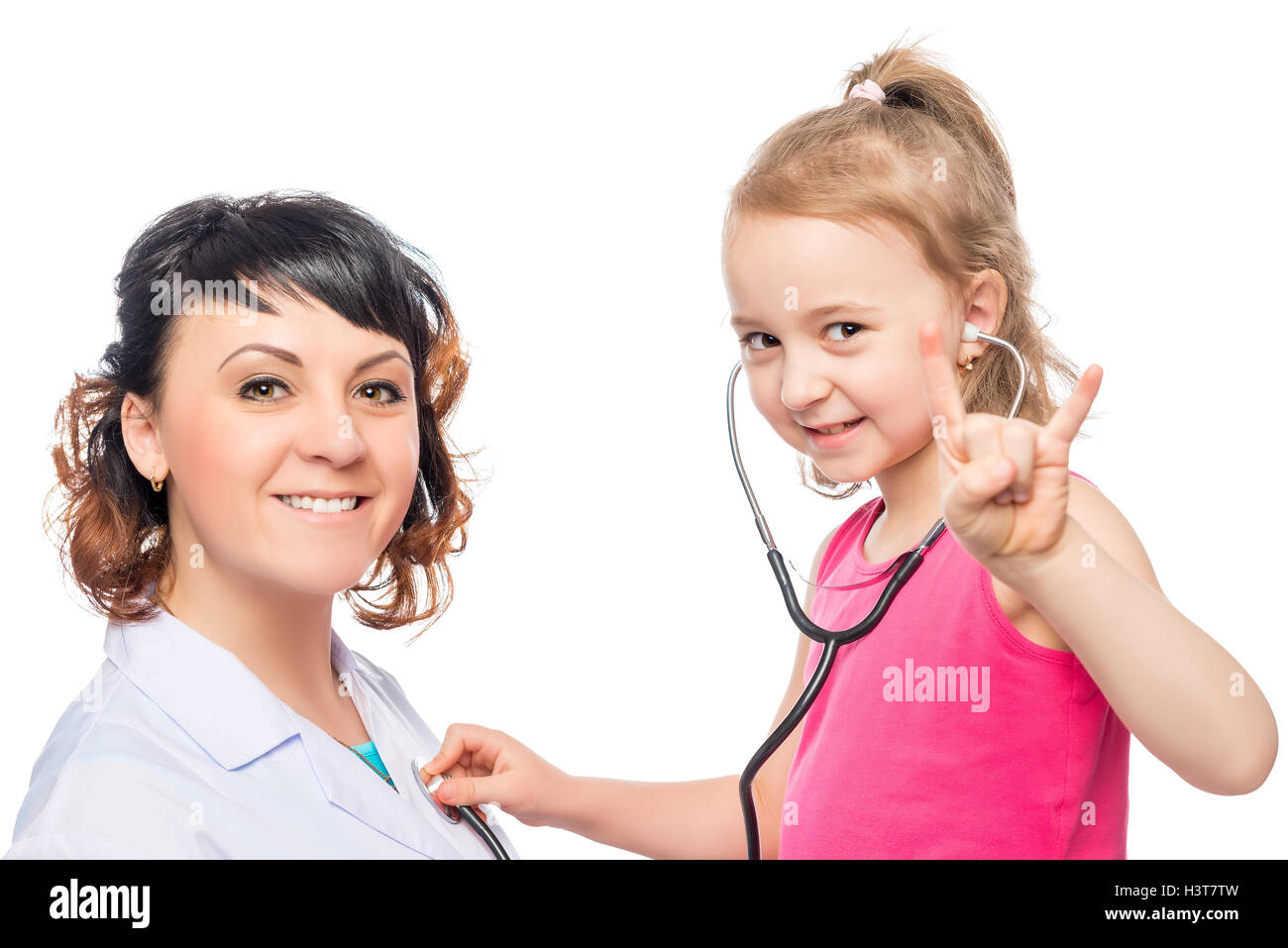 Porträt von glücklich Kinderarzt und Mädchen 7 Jahre der Patient auf einem weißen Hintergrund Stockfoto