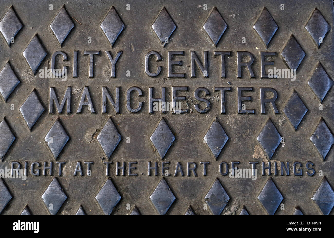 City Centre Manchester geprägt Gusseisengitter, direkt im Herzen von Things, England UK Stockfoto