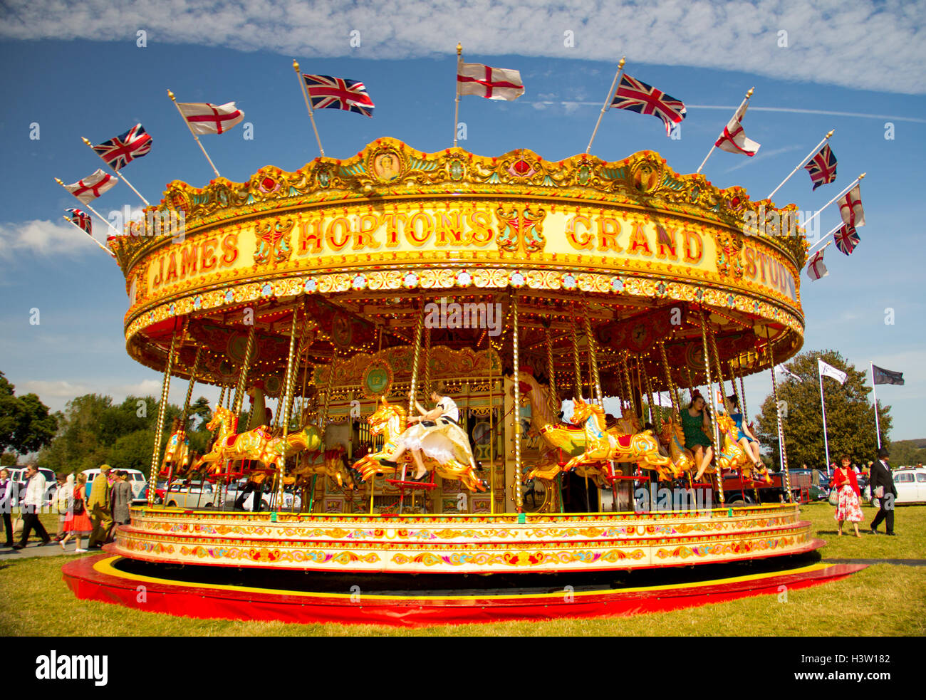 Kirmes frohe Go round Stockfoto