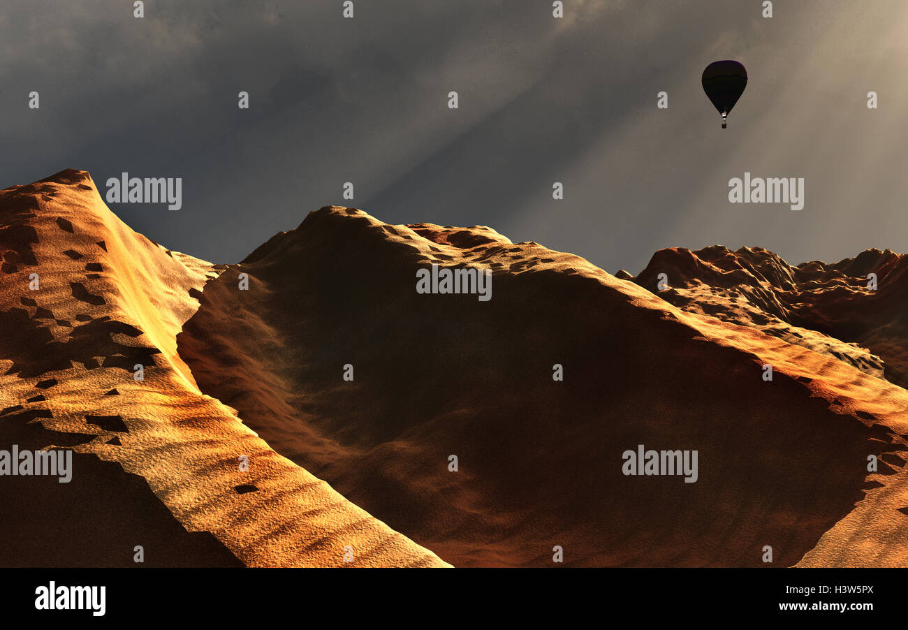 Heißluftballon über eine Wüste. Stockfoto