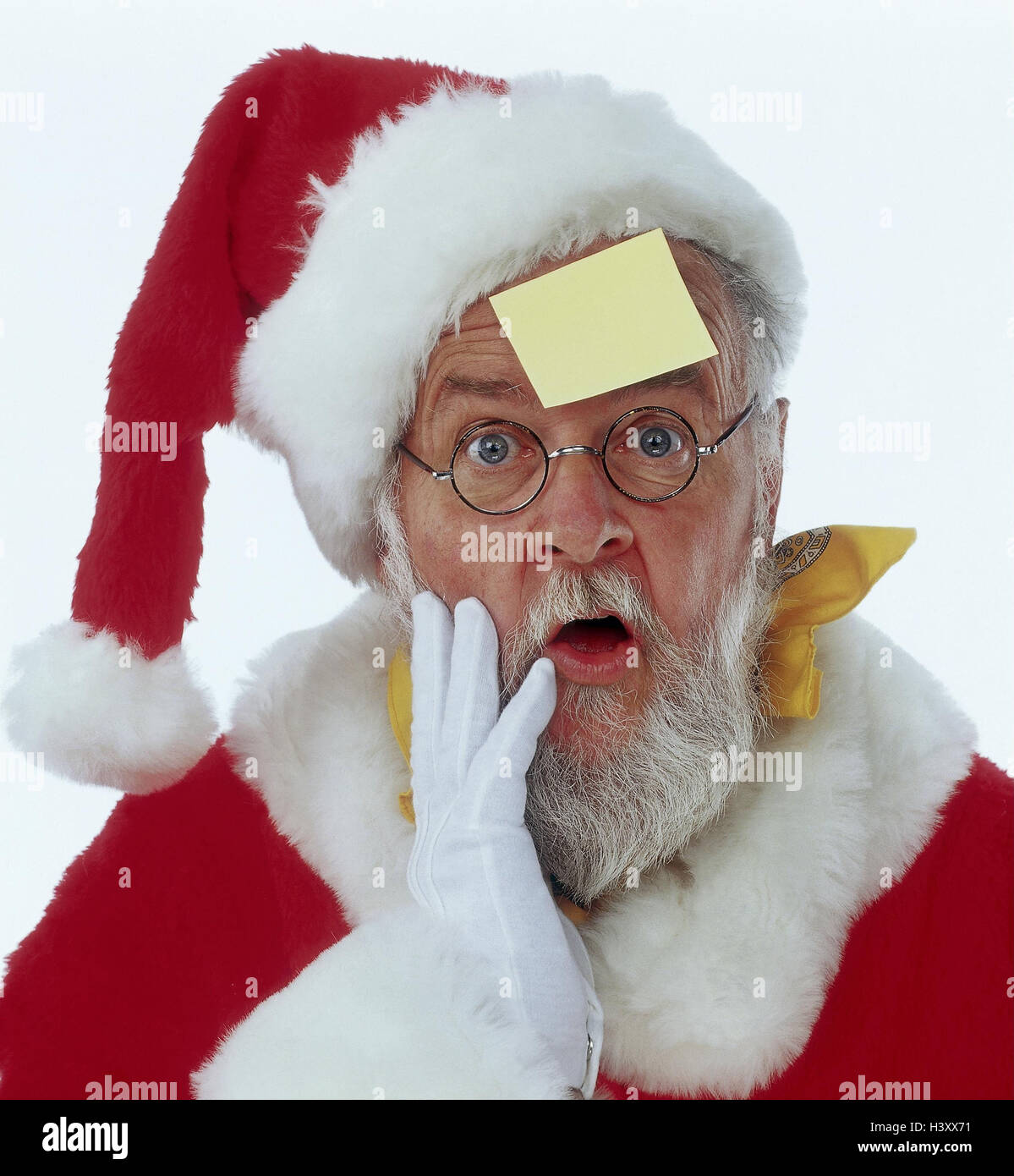 Santa Claus, Stirn, Slip Notizpapier, Geste, Schreck, Vergesslichkeit, Portrait, Studio, Freisteller, Weihnachten, Weihnachten, Weihnachtsmann, Santa, selbstvergessen, erschrecken, Lektion, Gedächtnisstütze, Hilfe, Hinweis Stockfoto