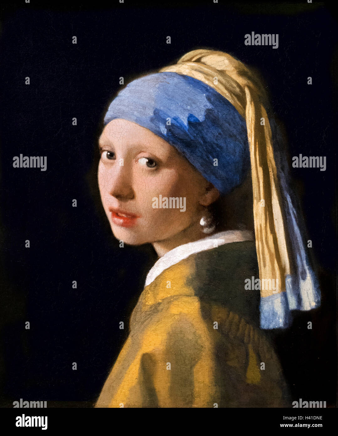 Johannes Vermeer das Mädchen mit dem Perlenohrring (Meisje met de parel), Öl auf Leinwand, c 1665. Malerei auf Anzeige im Mauritshuis, Den Haag, Niederlande. Stockfoto