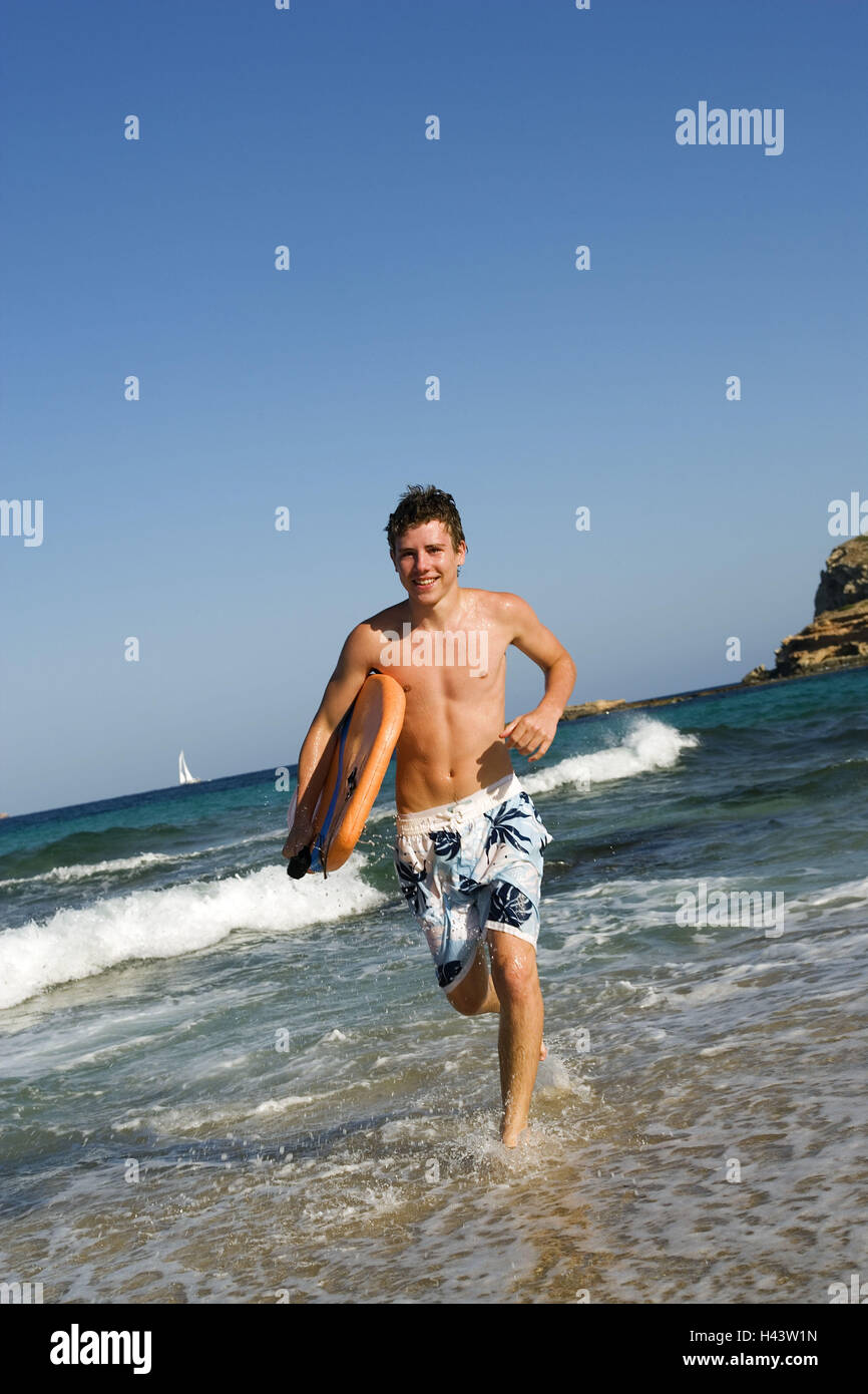 Junger Mensch, Bodyboard, Strand, laufen, Stockfoto