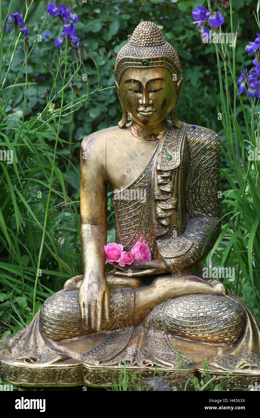 Buddha Figur, Garten, Schwertlilien, Stockfoto
