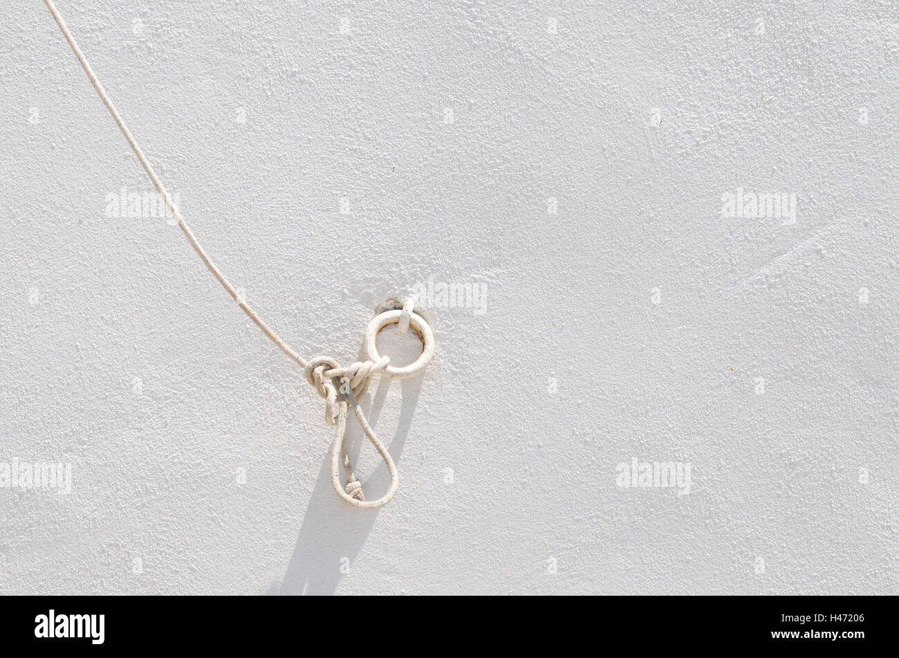 String und eisernen Ring an Wand, Insel Sifnos, Cyclades, Griechenland, Stockfoto