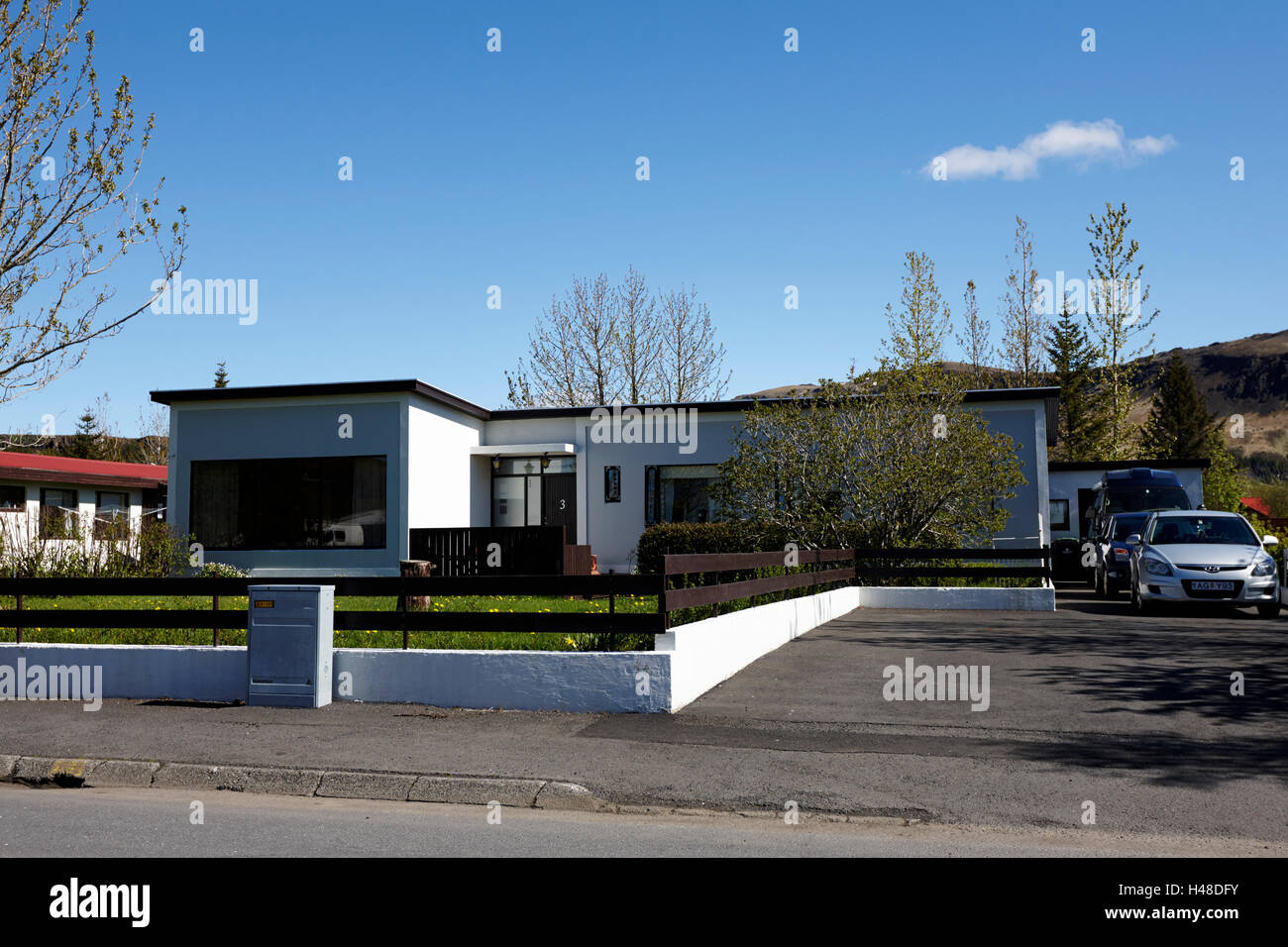 Stein Bungalow Häuser im Erdbebengebiet von Hveragerdi Island Stockfoto