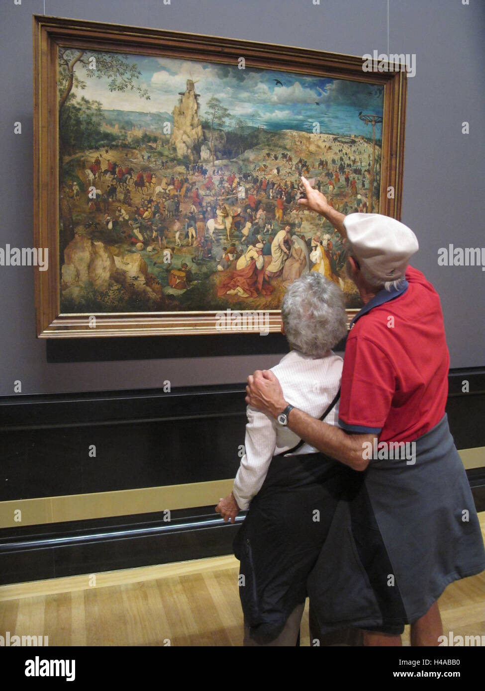 Museum der Geschichte der Kunst, Gemälde von Pieter Bruegel dem alten Menschen, "Die Kreuztragung Christi" von 1564, Besucher betrachten. Stockfoto