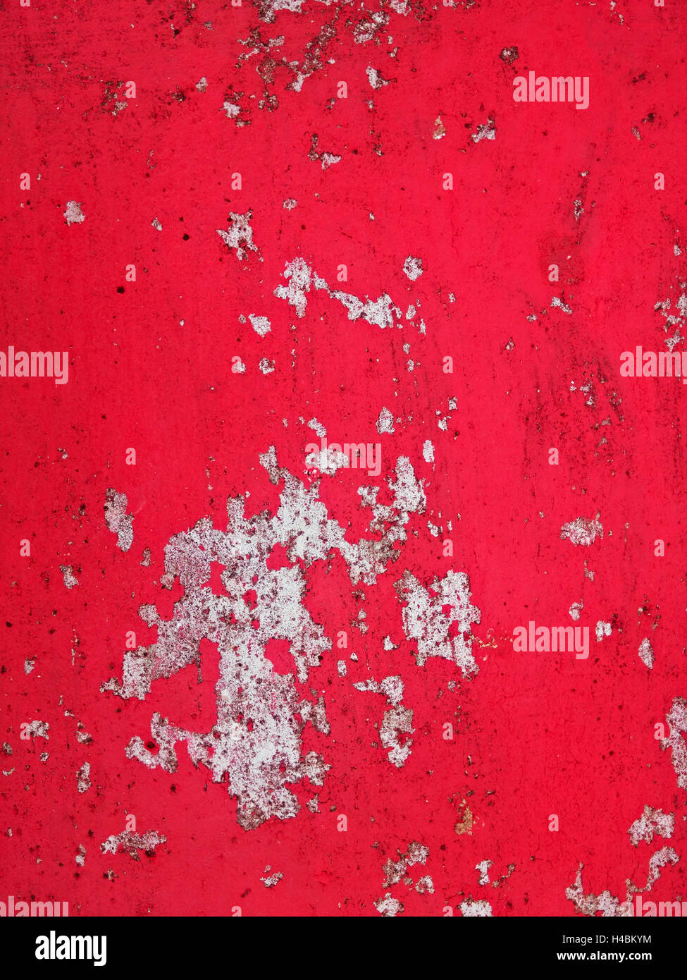 Closeup Aufnahme von gealterten und verfallene Betonoberfläche in rot Stockfoto
