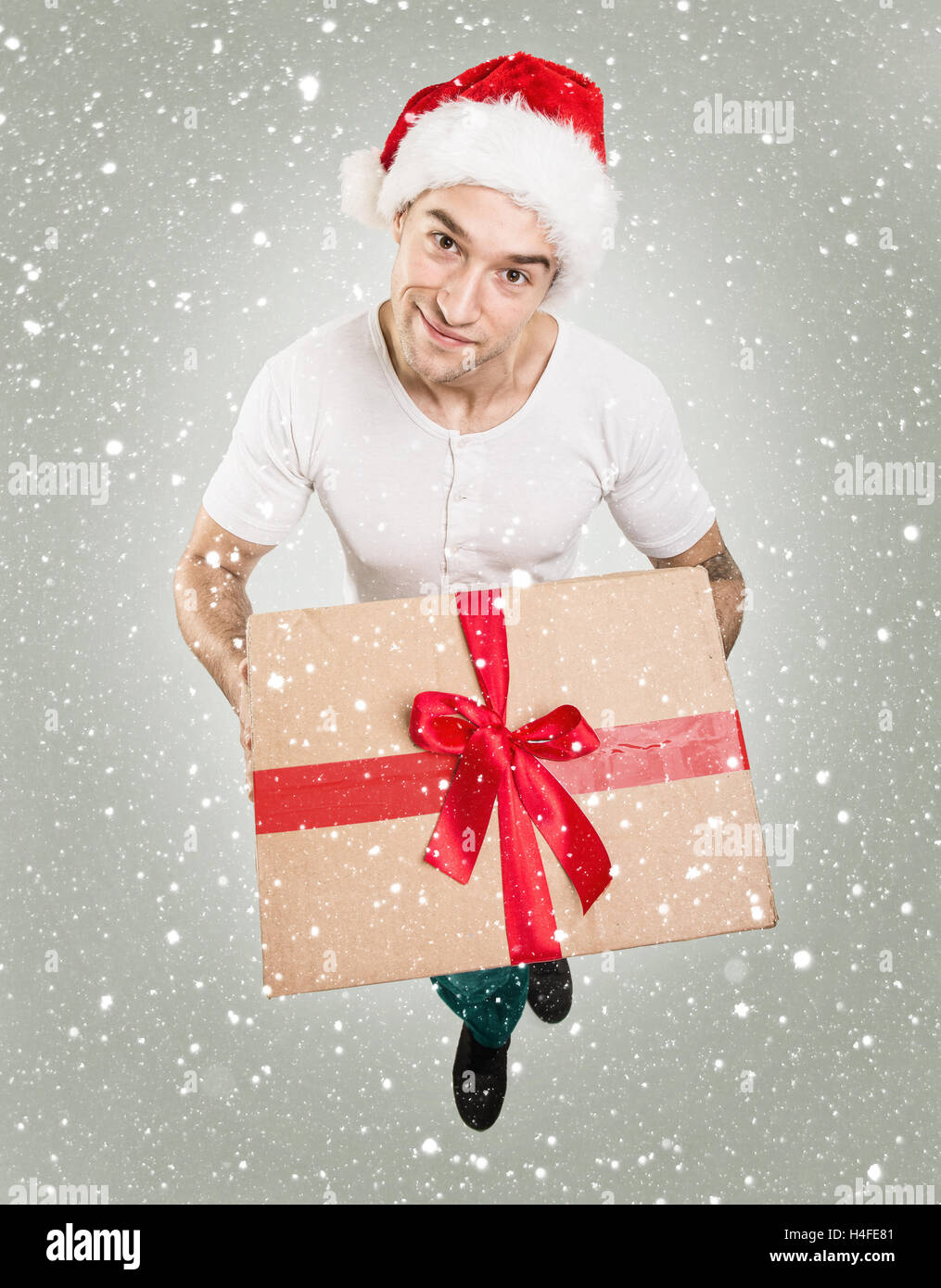 Santa Mann blickte, mit Geschenk Stockfoto