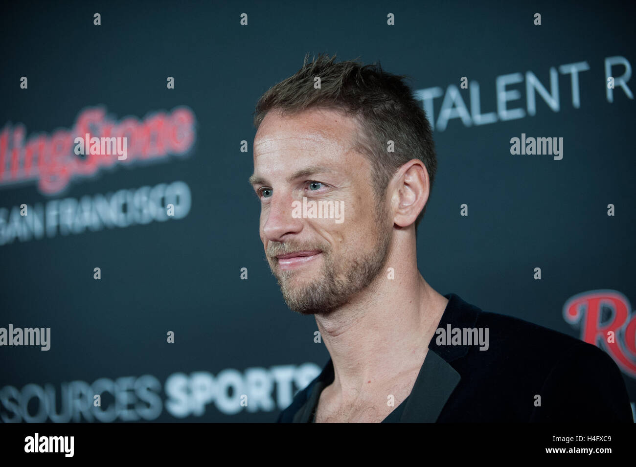 Jenson Button geht den roten Teppich auf der Rolling Stone Super Bowl 50 Party Stockfoto