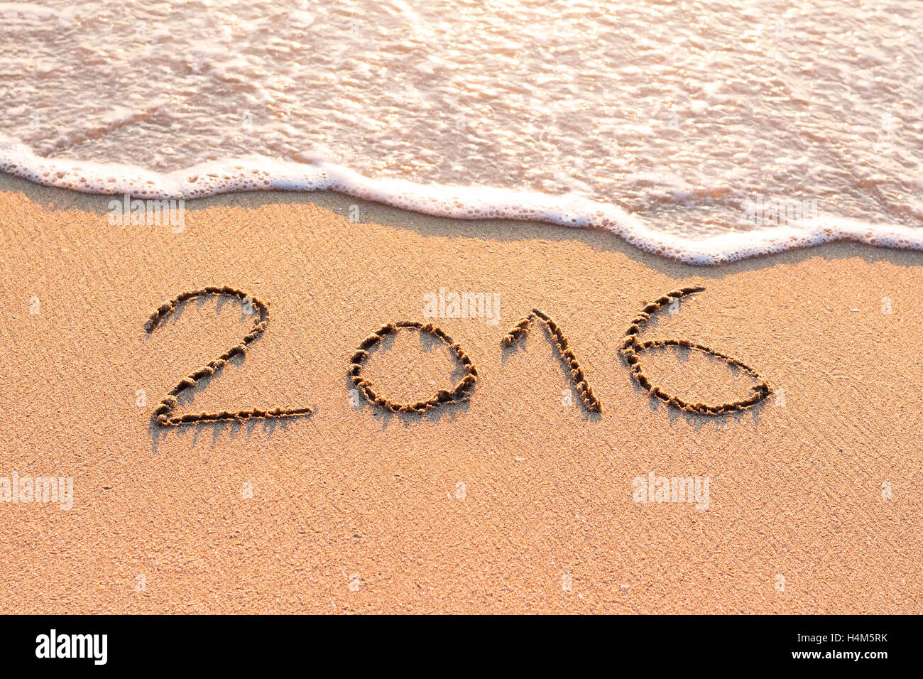 geschrieben auf einem Sandstrand, Konzept für Neujahr Grußkarten und Kalender 2016 Stockfoto geschrieben auf einem Sandstrand, Konzept für Neujahr Grußkarten und Kalender 2016 Stockfoto