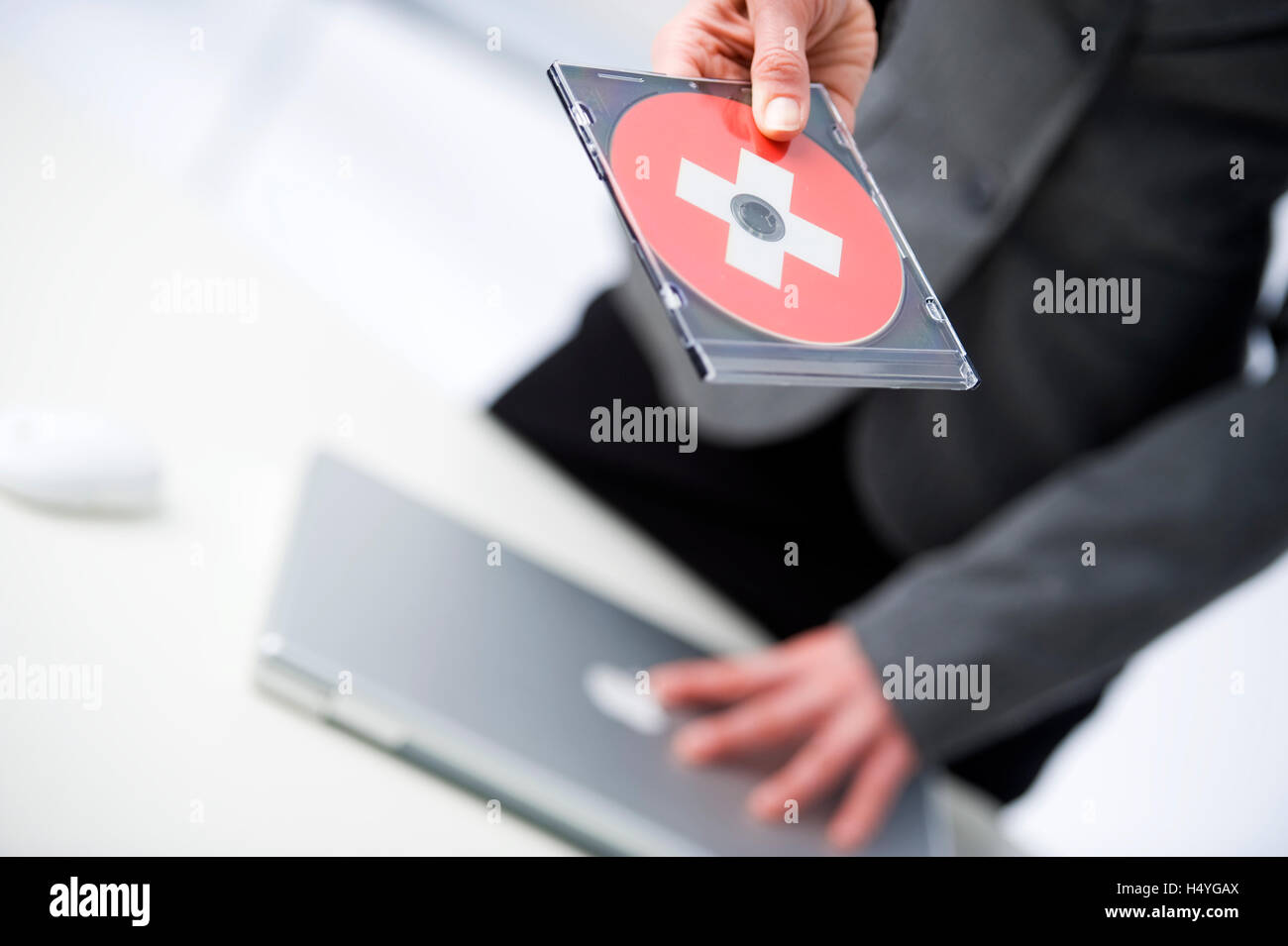 CD mit Schweizer Flagge Stockfoto