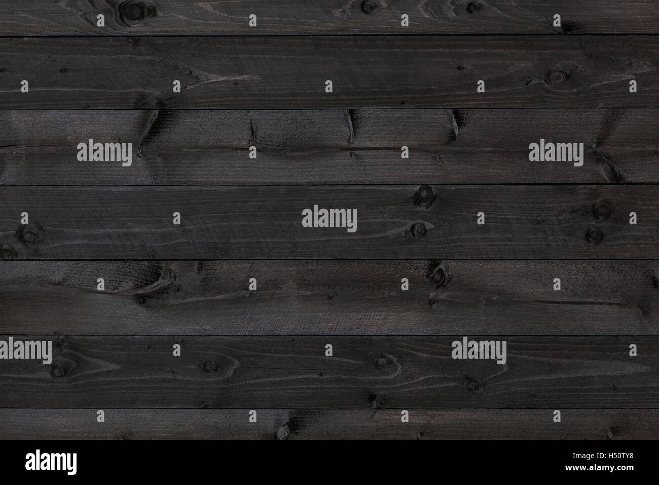 Dunkles Holz, schwarze Hintergrundtextur Stockfoto