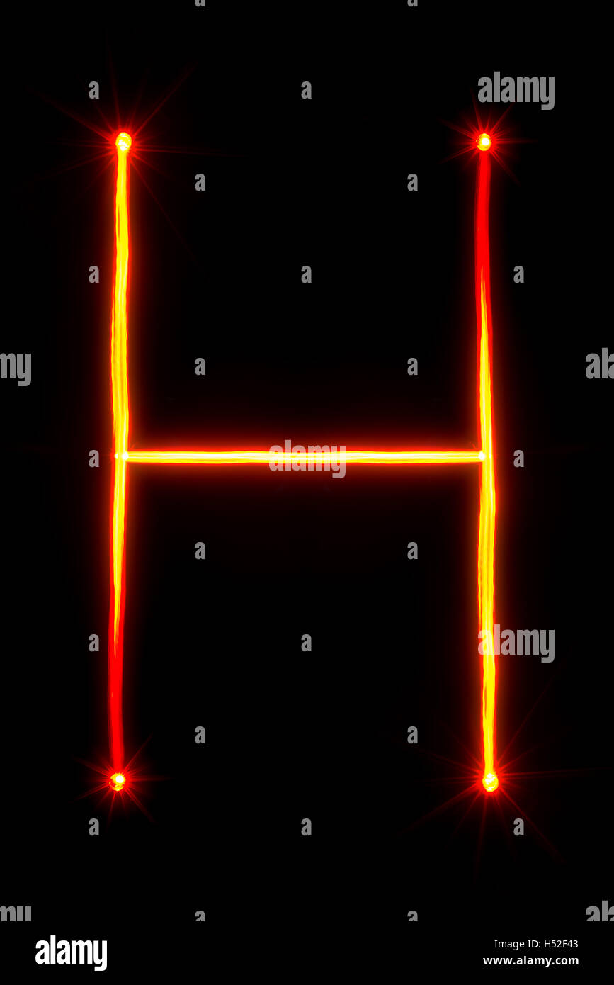 rotes Licht Malerei Buchstabe F auf schwarzem Hintergrund Stockfoto