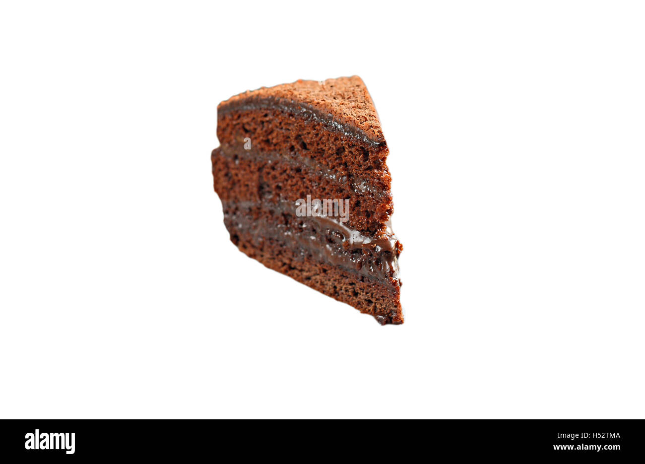 Stück Schokoladenkuchen isoliert. Stockfoto