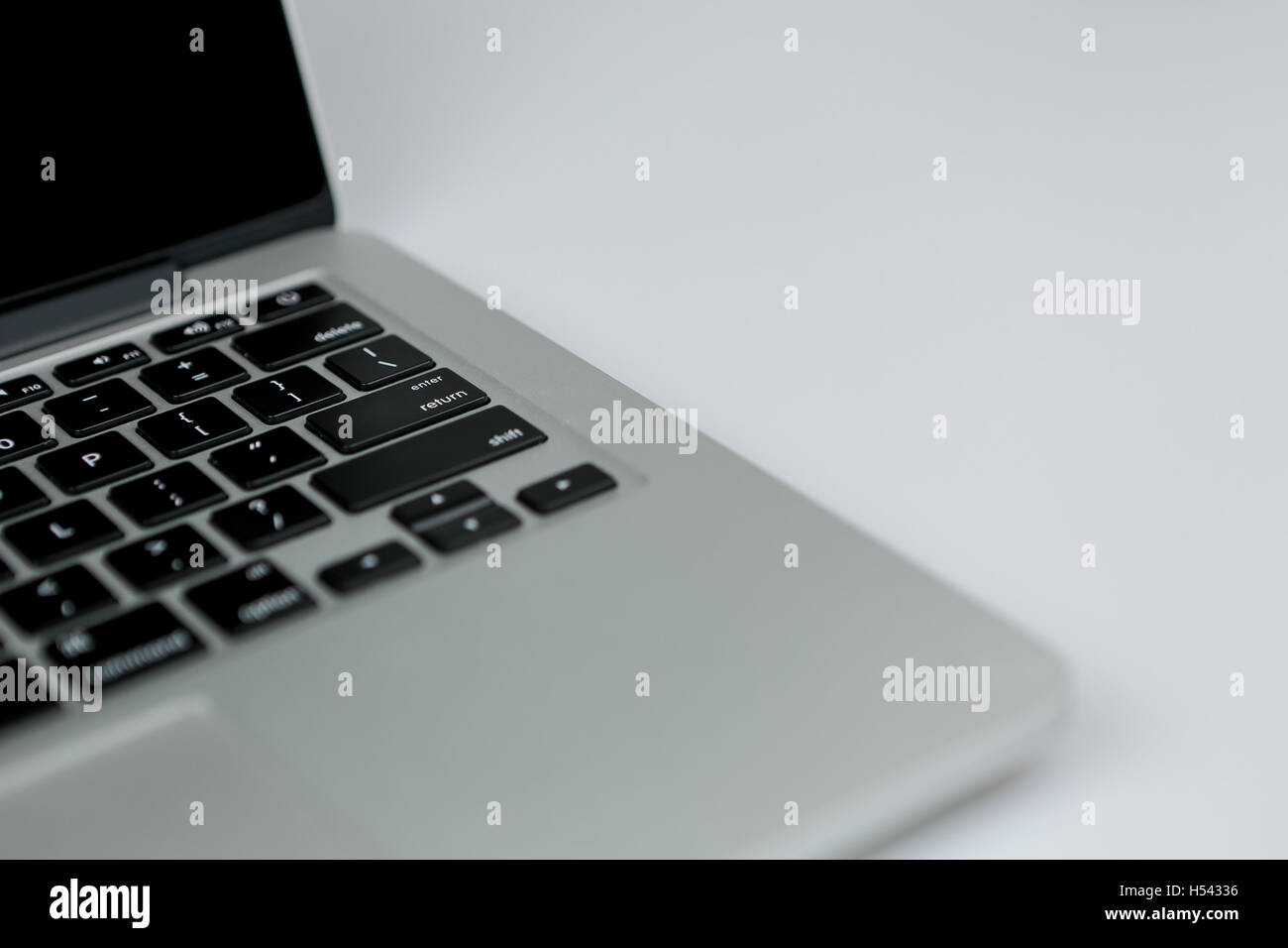 Closeup geschossen mit Fokus auf die return-Taste. schwarzen Tasten der Laptop Tastatur Nahaufnahme. Stockfoto