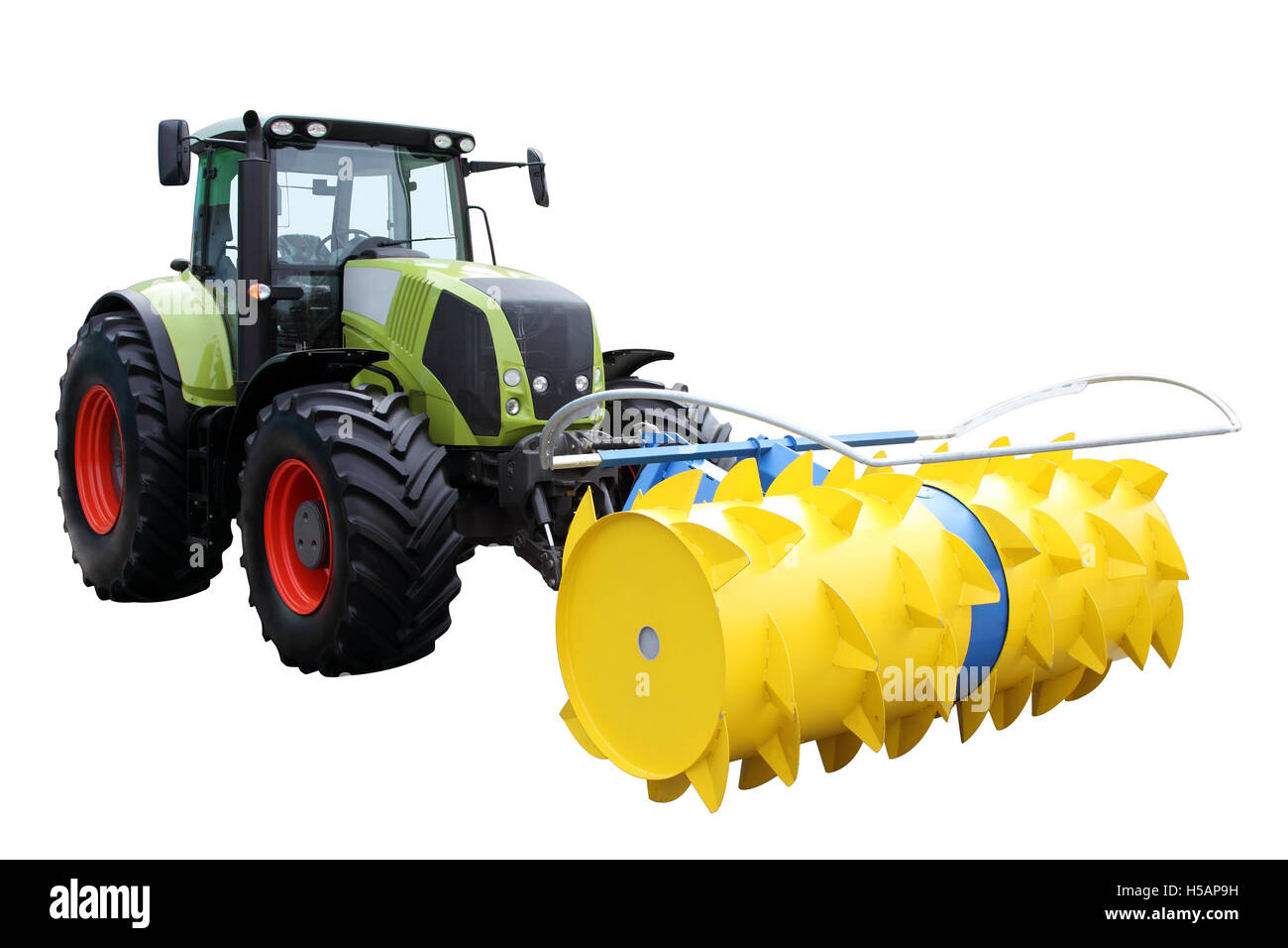 Grüner Traktor separat auf einem weißen Hintergrund Stockfoto