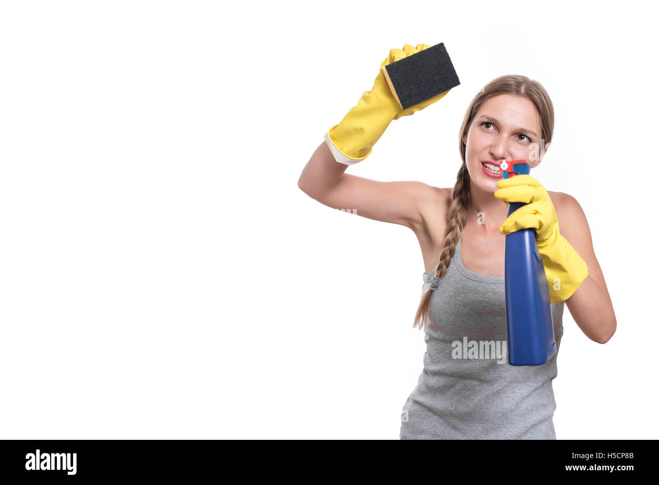 Junge Hausfrau Frau Reinigung, isolierten auf weißen Hintergrund Stockfoto