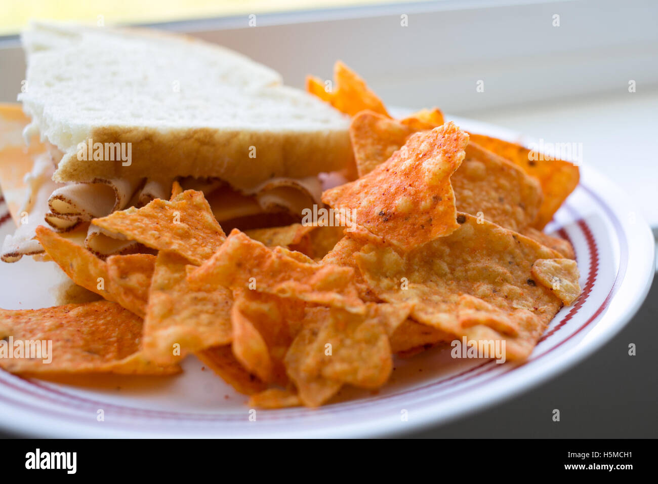 Nacho Käse Doritos und Sandwich Stockfoto