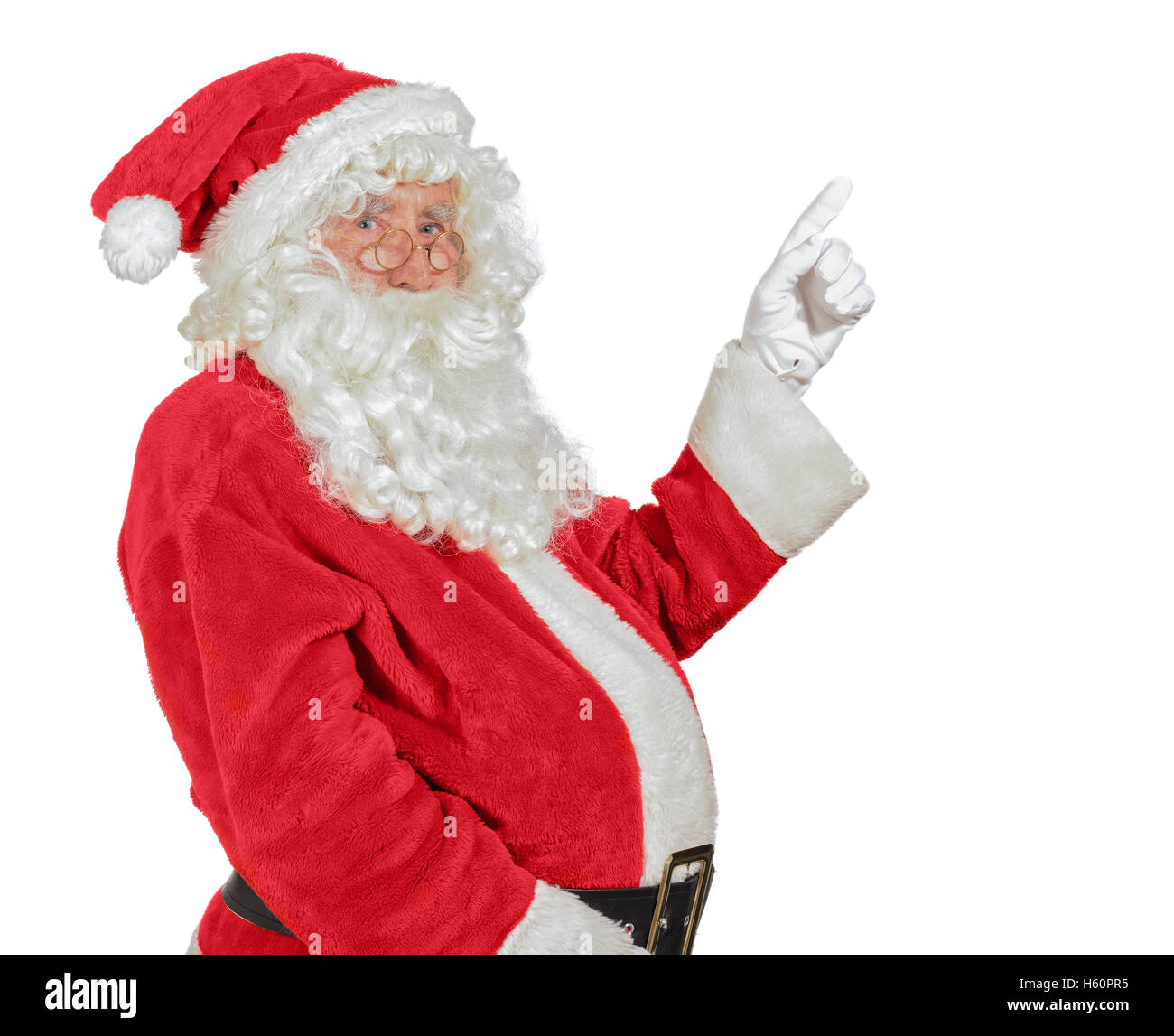 Santa Claus in behandschuhten Hand mit weißen textfreiraum für Werbung zeigen Stockfoto