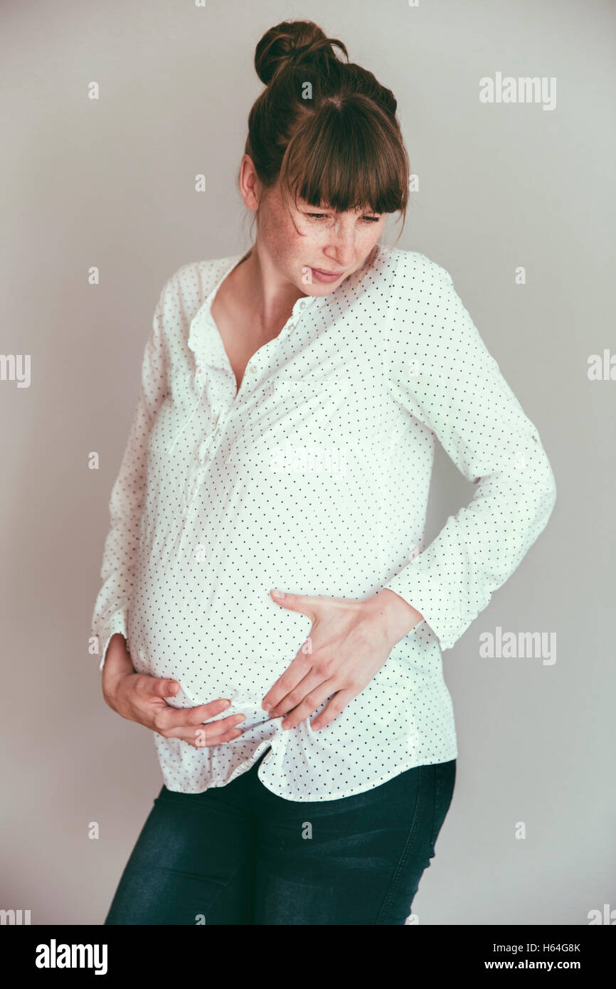 Werdende Mutter Gefühl Kontraktionen Stockfoto