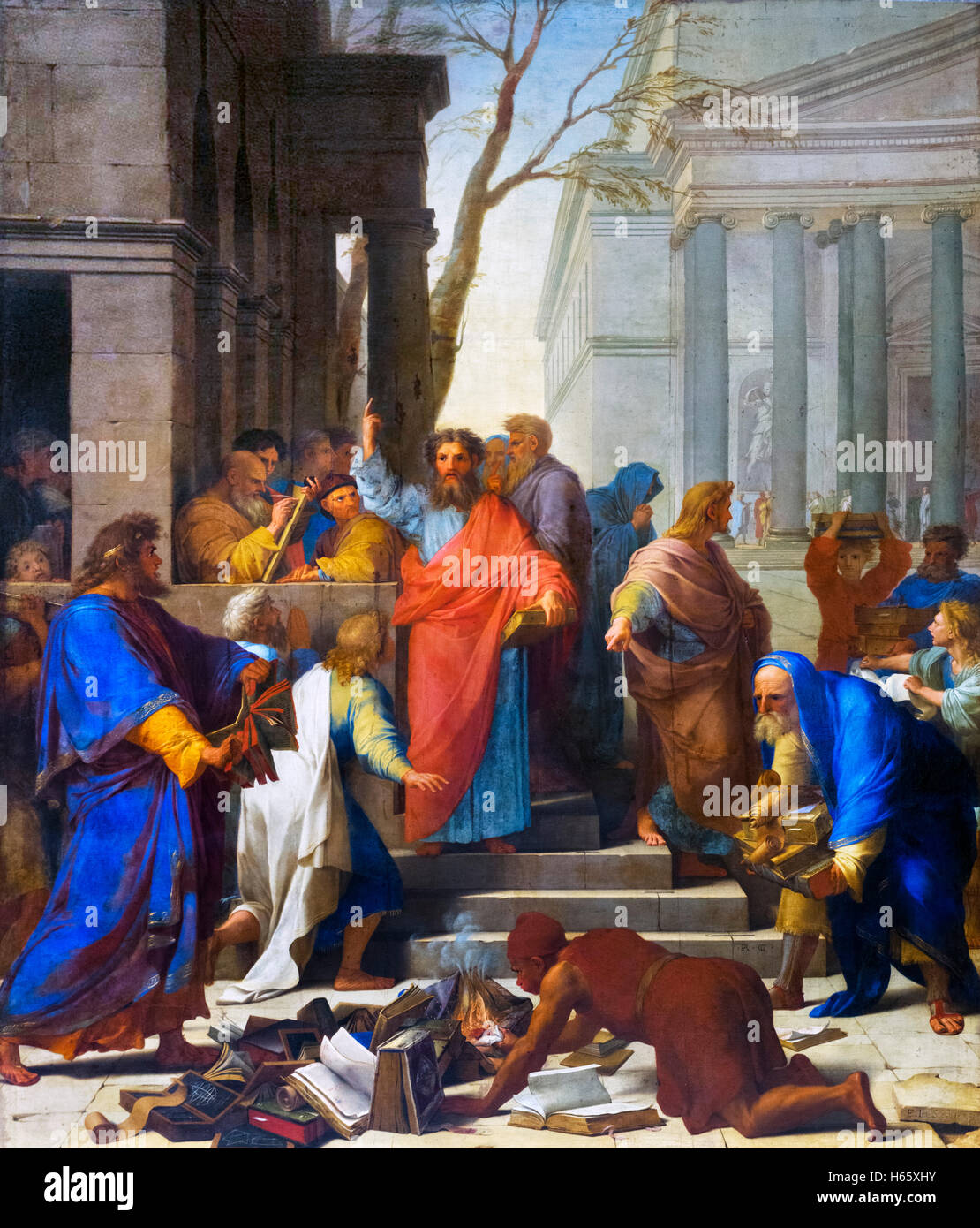 Die Predigt von Paulus in Ephesus (La Prédication de Saint Paul À Éphèse) von Eustache Le Sueur, Öl auf Leinwand, 1649.  Paulus sieht man Predigt während Bücher über Zauberei im Vordergrund verbrannt sind. Stockfoto