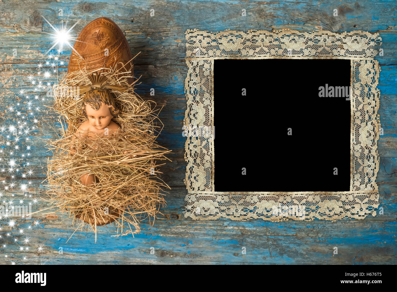 Weihnachten mal Vintage Bilderrahmen, Antik Jesuskind auf primitiven Holz Hintergrund Stockfoto