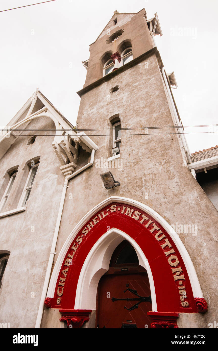 Charles Shiels Institution Armenhäuser, Carrickfergus, gebaut im Jahre 1868 als gemeinnütziger Verein für "mittellose Frauen". Stockfoto