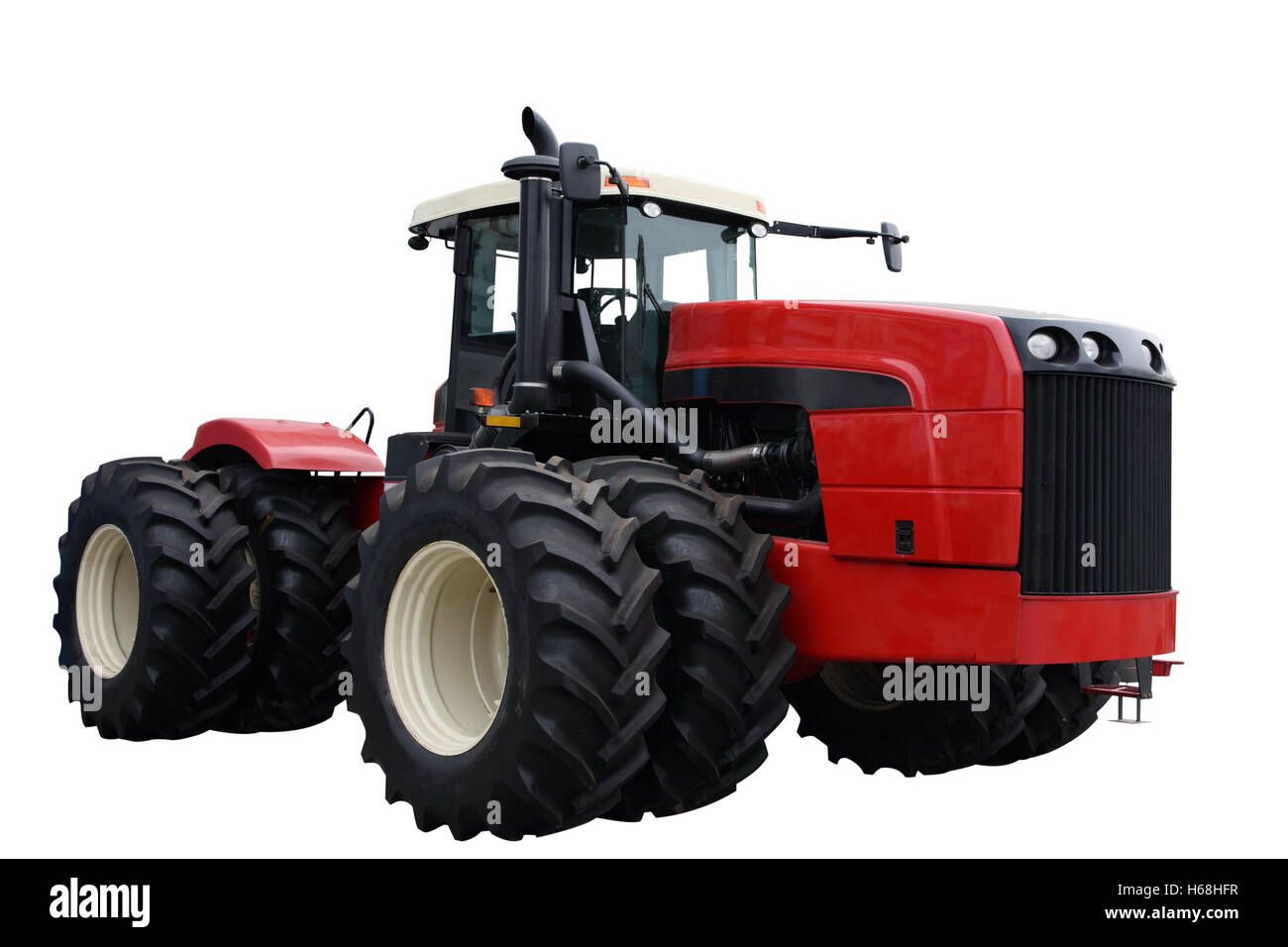 Roter Traktor isoliert auf weißem Hintergrund Stockfoto