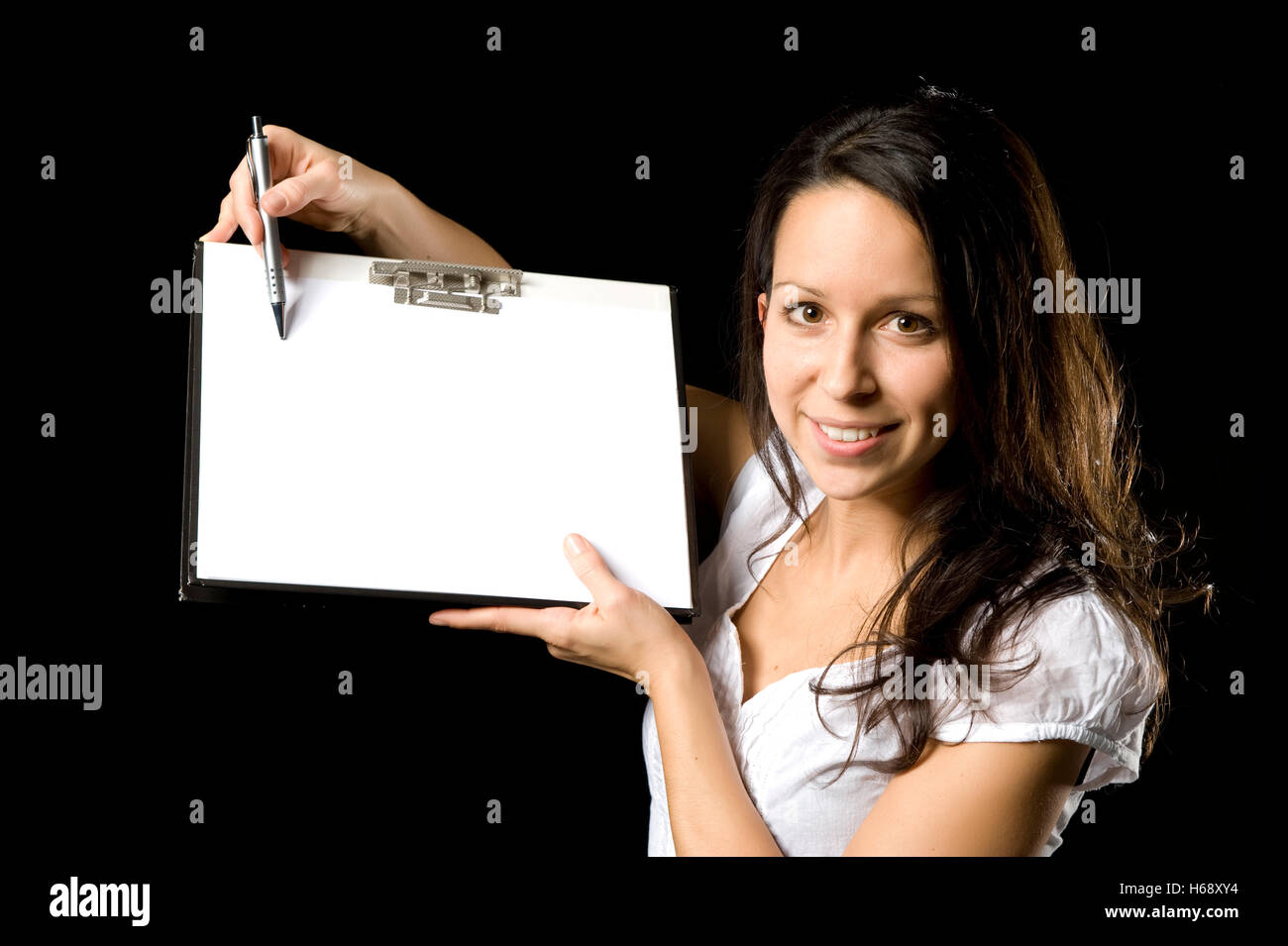 Geschäftsfrau mit Schreibblock Stockfoto