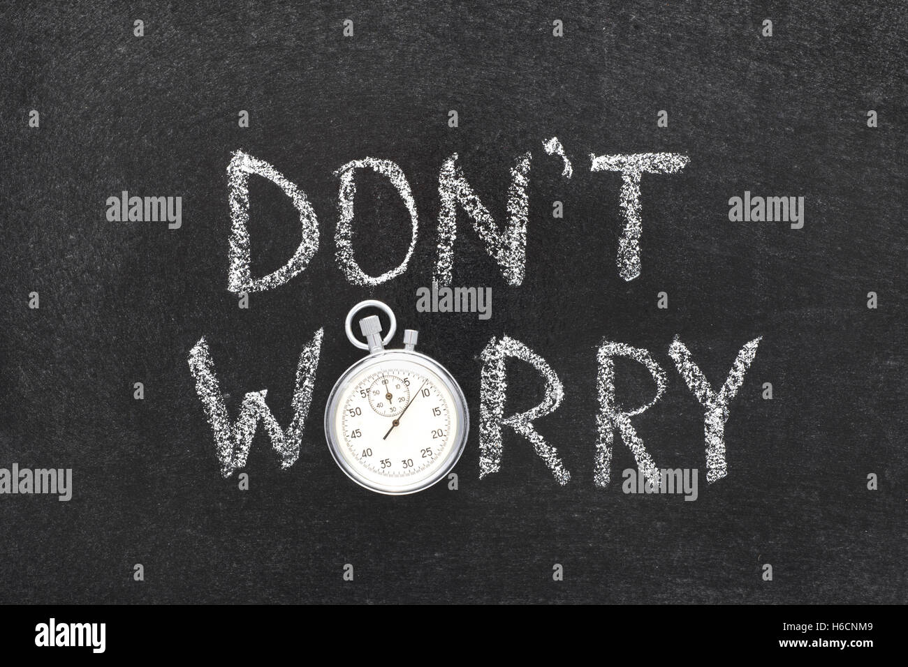 keine Sorge Ausdruck handschriftlich auf Tafel mit Vintage präzise Stoppuhr verwendet anstelle von O Stockfoto