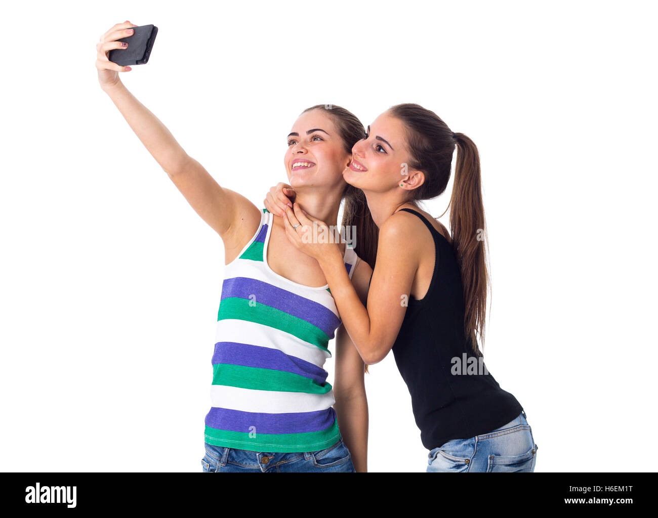 Zwei junge Frauen machen selfie Stockfoto