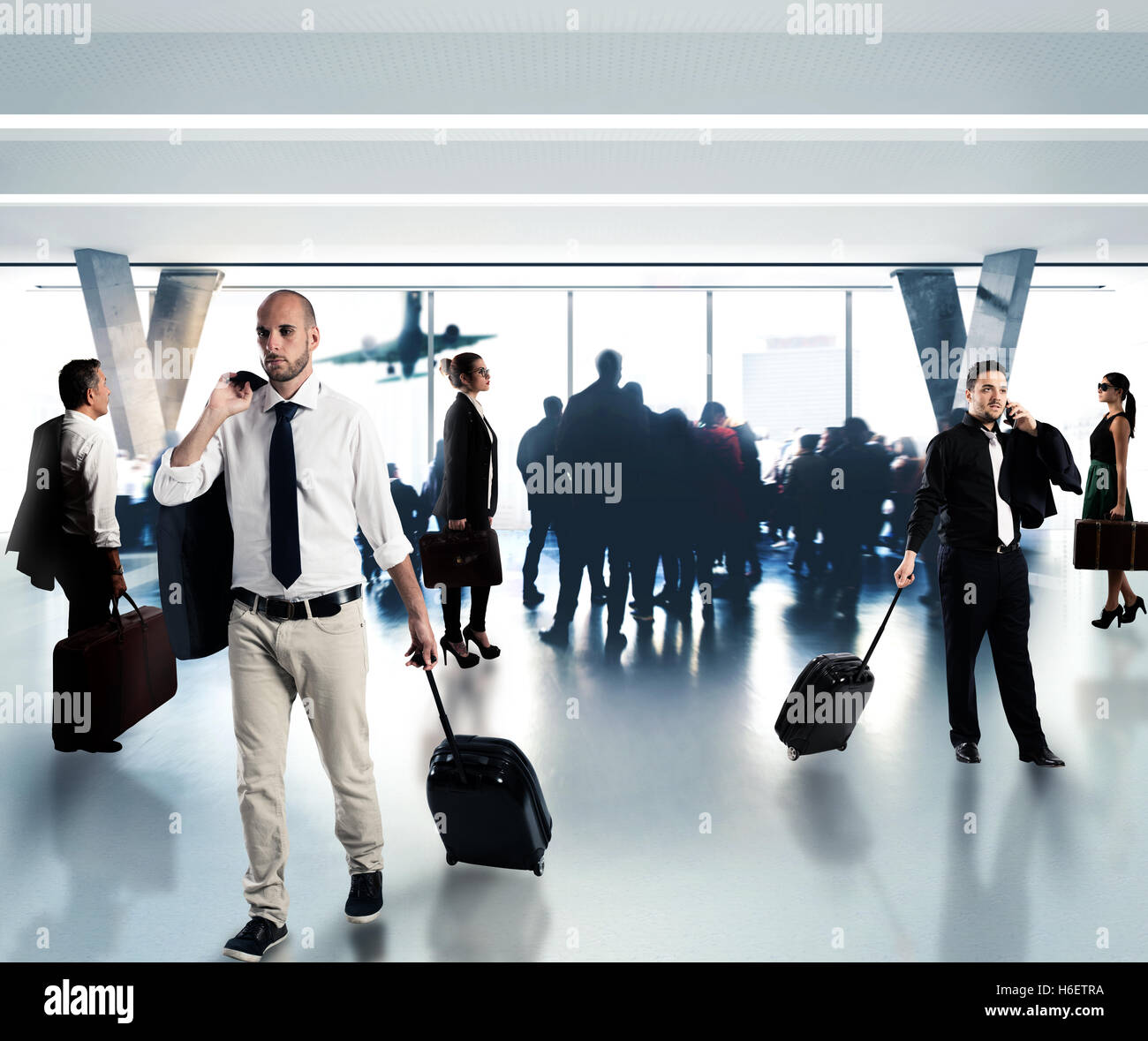 Beschäftigt Geschäftsleute am Flughafen Stockfoto