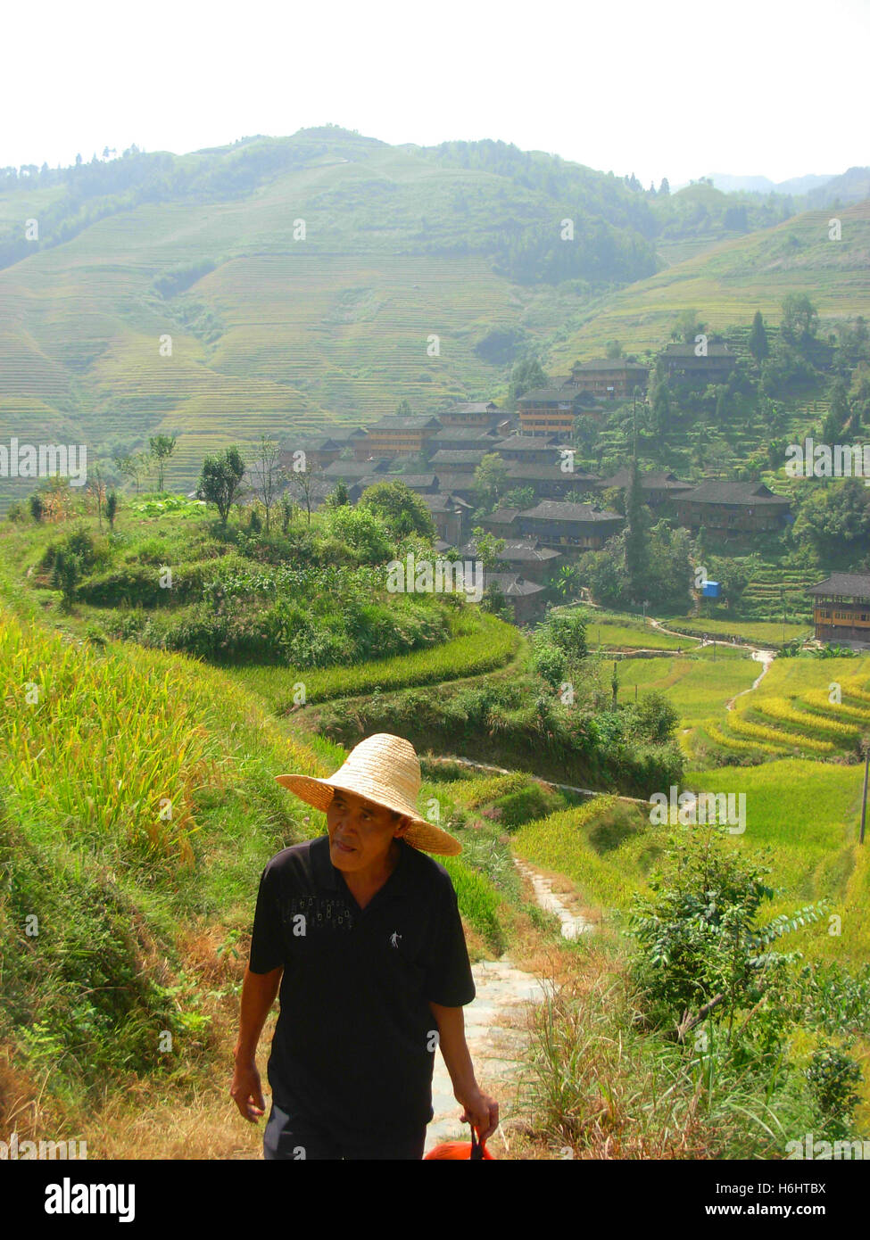 Chinesische Bauern in Dazhai traditionelles Dorf, Guilin, Provinz Guangxi, China Stockfoto