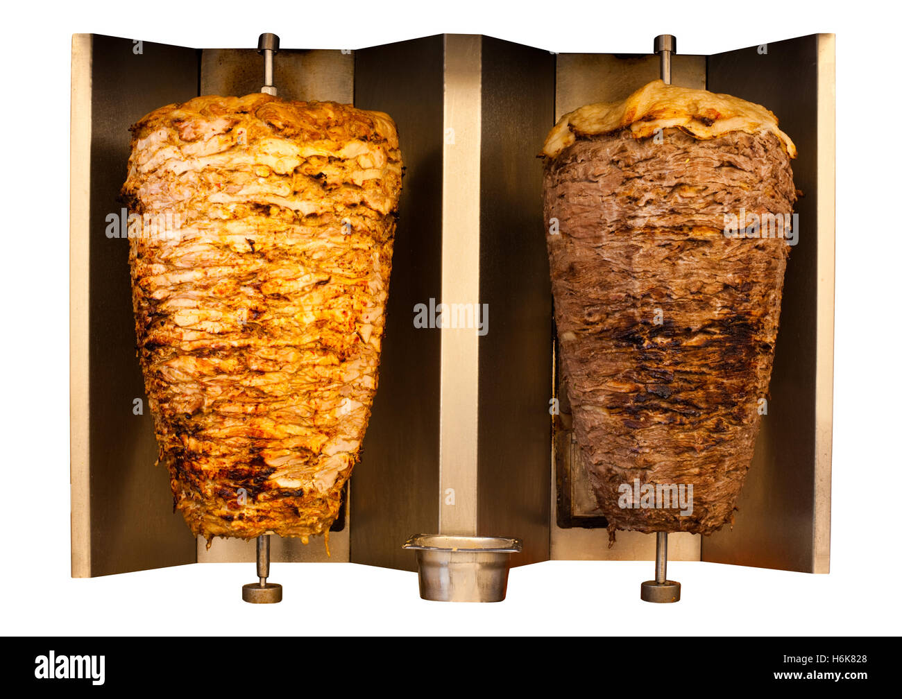 Aufgespießt Fastfood Huhn und Lamm Hammel Kebab, Döner Fleisch kochen und drehen nebeneinander auf rotierenden spucken arabischen Ländern Stockfoto