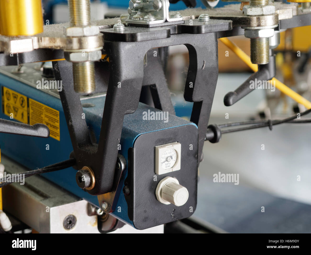 M&R Siebdruck Presse detail Stockfoto