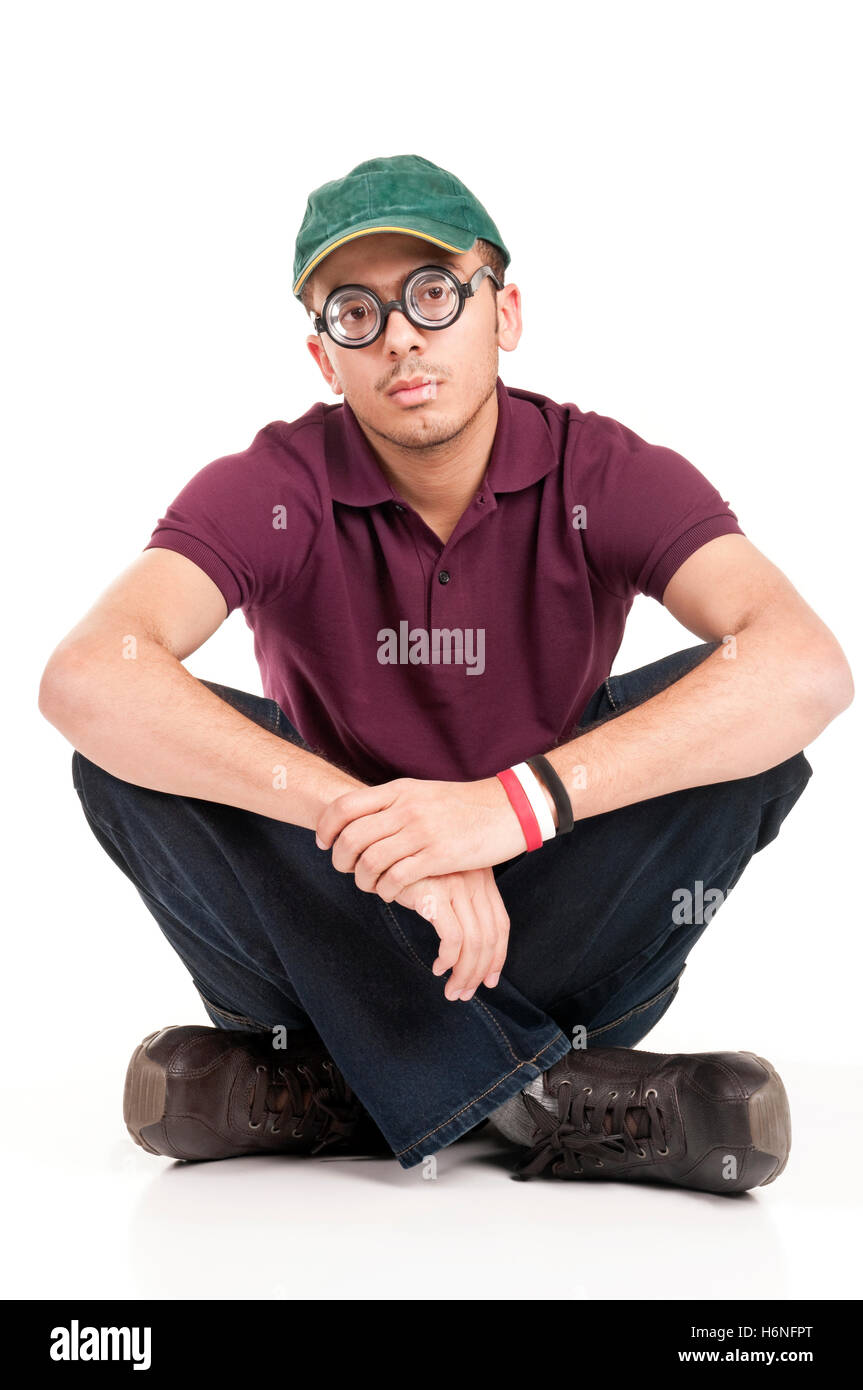 Nerd sitzt Stockfoto