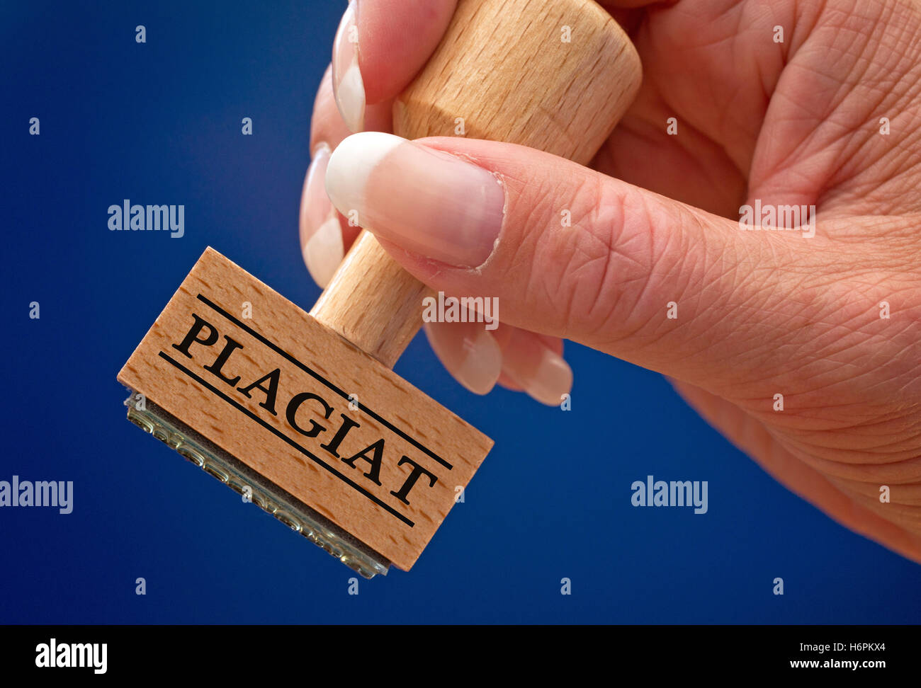 Plagiat - Stempel Mit hand Stockfoto
