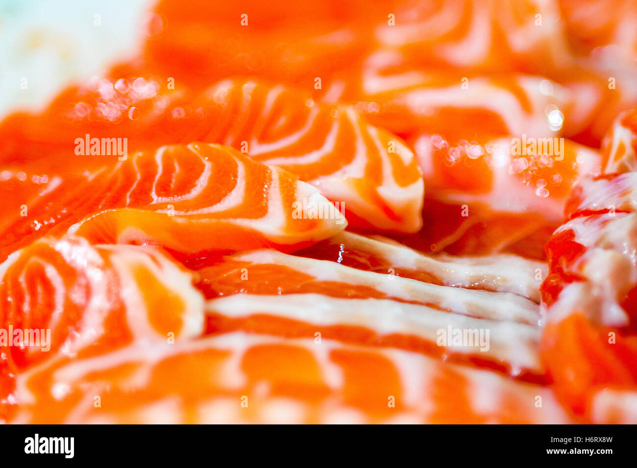 Lachs-Sashimi, Close Up des Musters auf Scheibe Lachs Stockfoto