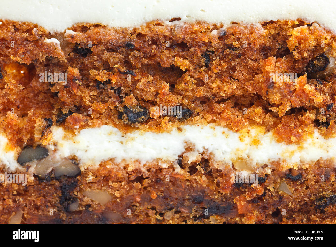 Abstrakten Detail der Karotte-Kuchen mit Zuckerguss. Stockfoto