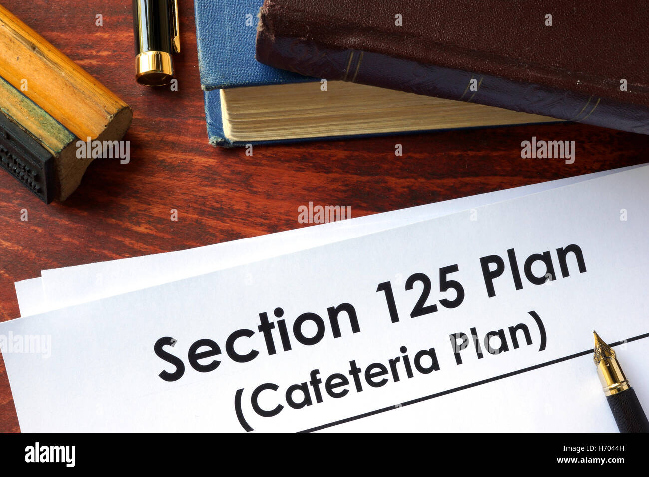 Papiere mit Abschnitt 125 Plan (Plan Cafeteria) an einem Tisch. Stockfoto