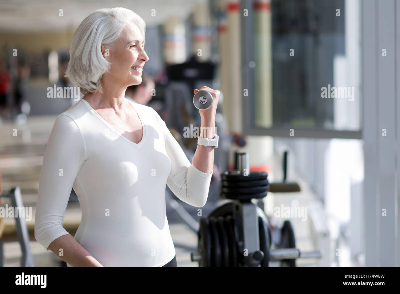 Sportliche senior Frau trainieren. Stockfoto