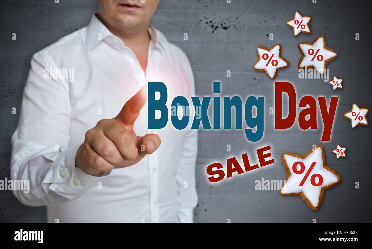 Boxing Day Sale Touchscreen wird von Menschen betrieben. Stockfoto